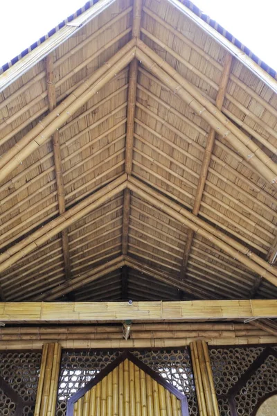 stock image the Kiram mosque on Banjarbaru, indonesia, the walls are made of woven bamboo and the roof is made from dried straw leaves