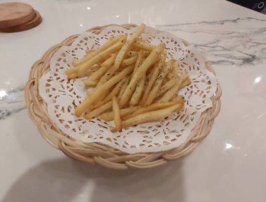Close up frech fries on white plate