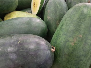Watermelons in the market, close-up, background, selective focus