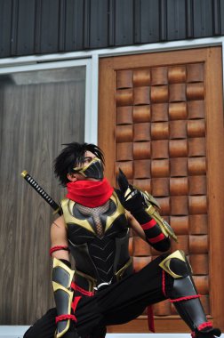 Jakarta, Endonezya - 29 Ekim 2022: Cosplayer as Hayabusa, Mobile Legends Game 'in bir kurgusal karakteri.. 