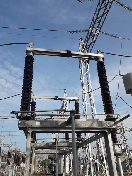 Disconnecting switch on high-voltage substation. switching device used to provide safe isolation by de-energising parts of an electrical network.
