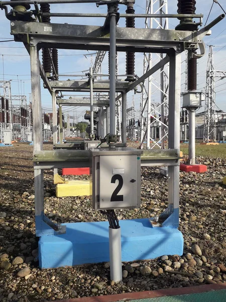 Disconnecting switch on high-voltage substation. switching device used to provide safe isolation by de-energising parts of an electrical network.