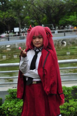 Banjarmasin, Endonezya - 25 Haziran 2023: Anime DATE A Live 'dan Cosplayer kostümlü güzel bir genç kadın oyununun portresi