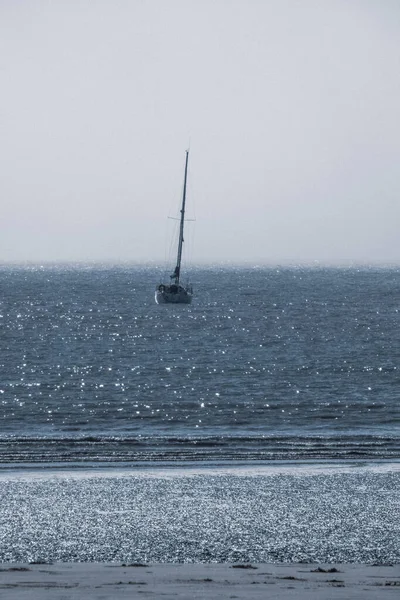 View of a boat on the ocean.