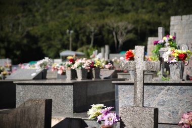resting place for us all. destinies of all mankind. the cemetery. this is a beautiful, well-kept cemetery with flowers and well-tended headstones