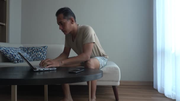 Concept Idea Asian Man Using Laptop While Sitting Coach Living — Stock Video