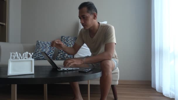 Concept Idea Asian Man Using Laptop While Sitting Coach Living — 图库视频影像
