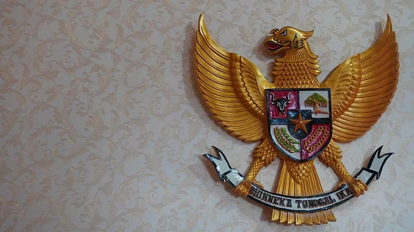 Surabaya, East Java, Indonesia - February, 2023 : Garuda bird is the national symbol of Indonesia. Similar with eagle or phoenix    
