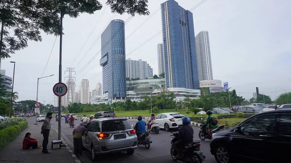 Surabaya, East Java, Indonesia - February, 2023 : Four Point Hotel by Sheraton tower building in the PTC Pakuwon Trade Center mall with beautiful cloud sky background                   