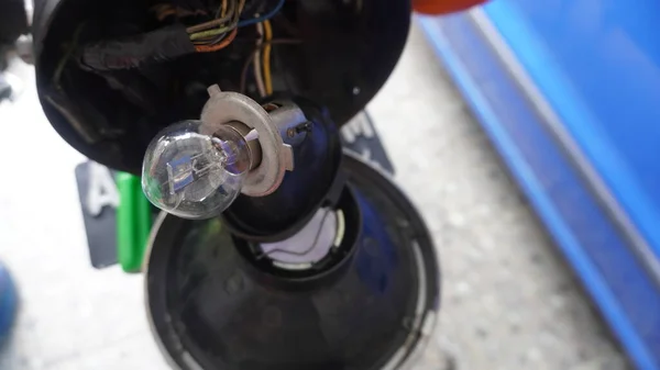 motorcycle light bulb in socket