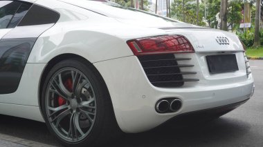 Surabaya, East Java, Indonesia - February, 2023 : elegant and luxurious sports car Audi R8 white color                           