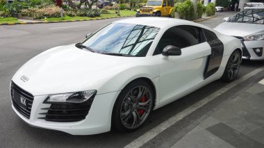 Surabaya, East Java, Indonesia - February, 2023 : elegant and luxurious sports car Audi R8 white color                           