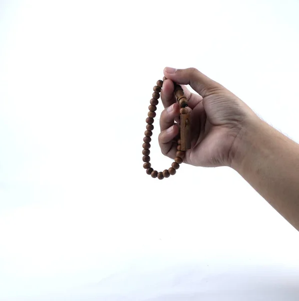 Mão Segurando Contas Oração Isolado Fundo Branco — Fotografia de Stock