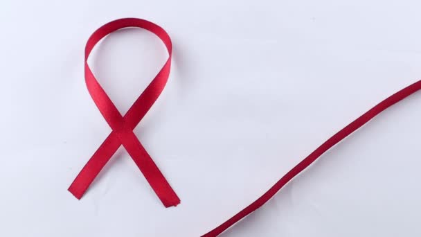 Ruban Soutien Rouge Isolé Sur Fond Blanc Journée Mondiale Aide — Video