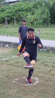 Gorontalo, March 2023 - A takraw competition held by the youth organization of Tualango village to commemorate the youth competition clipart