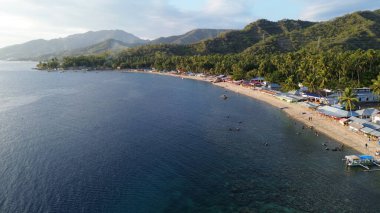 Aerial view of the spectacular Botutonuo beach, Gorontalo, Indonesia. Aerial view of tropical beach on the island clipart