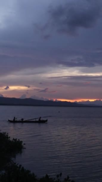 Vertical Video Fisherman Silhouette His Boat — стоковое видео