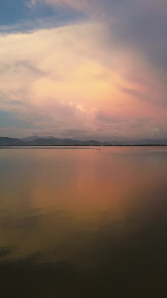 Vertical Drone Footage Limboto Lake Mountains Sunset — стоковое видео