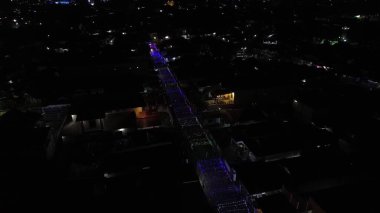 aerial view of Colorful light show in the city at night clipart
