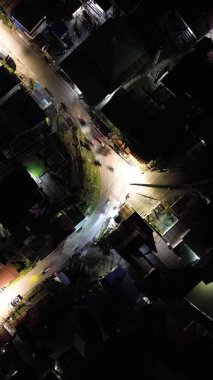 Aerial view of the streets of the city in the evening. Gorontalo, Indonesia clipart