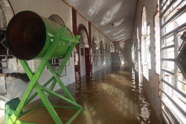 The flooded mosque in the Village of Tualango of Gorontalo clipart