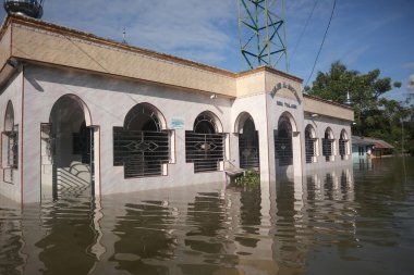 The flooded mosque in the Village of Tualango of Gorontalo clipart