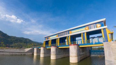 Sunrise at the dam in the Gorontalo, Indonesia clipart