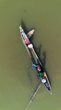 fisherman boat in the lake, Gorontalo, Indonesia clipart