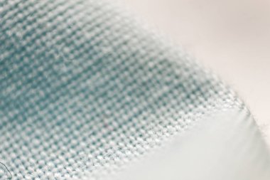 Kumaş örgüsü ile yapılmış desenli arka plan. Detaylı olarak toplanmış, kapatılmış.