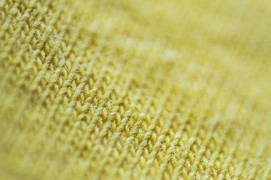 Kumaş örgüsü ile yapılmış desenli arka plan. Detaylı olarak toplanmış, kapatılmış.