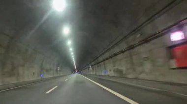 Full 5.7km time-lapse of the Marao Tunnel on the A4 motorway connecting Amarante and Vila Real, Portugal captured during the day.
