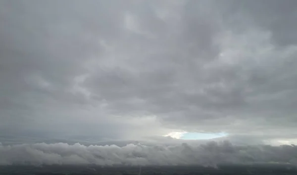 High Angle Footage of Dramatic Clouds and Sky over City, Aerial view of Gorgeous Clouds and above the clouds,