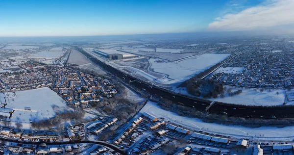 High angle view of Snow covered North Luton\'s landscape and Cityscape, Aerial Footage of Northern Luton City of England UK after Snow Fall. The 1st Snow Fall of this Winter of 2022