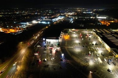 Unreleased Editorial. Illuminated View of Luton City of England UK During Night. Aerial View of Road and Traffic with Businesses at Night. Drone's Camera Footage was Captured on a Cold Night of 23rd January 2023