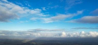 Dramatic Clouds and Blue Sky over City