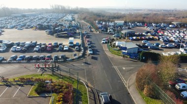 UNITED KINGDOM, BEDFORD - 6TH FEBRUARY, 2023: Aerial View of Huge and Big Car Parking of Local Car Sales Auctions at Kempston Bedford Town of England United Kingdom