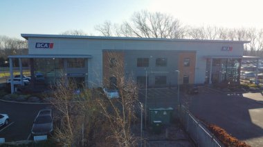 UNITED KINGDOM, BEDFORD - 6TH FEBRUARY, 2023: Aerial View of Huge and Big Car Parking of Local Car Sales Auctions at Kempston Bedford Town of England United Kingdom