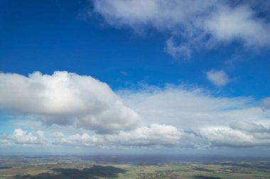 Winter Clouds over City During sunny Day