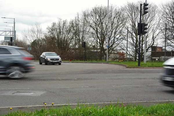 stock image UK, ENGLAND, LUTON - 19TH MARCH 2023: Luton Town During Cloudy Day over England. Streets and cars in English city at Daytime 