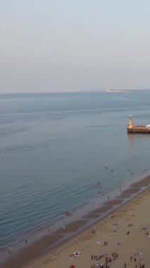 Aerial view of Fast, Racing and Sports Boats in the Ocean, High Angle footage of Beach of Bournemouth City of England UK