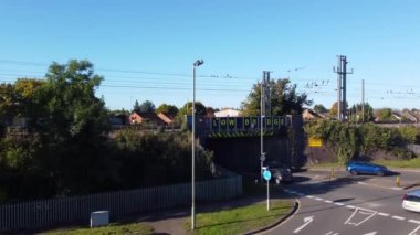 Aerial footage and high angle Train on Tracks at Central Luton Railway Station and City Centre of Luton Town of England UK