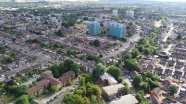 Aerial footage by drone high angle view of London Luton City of England with Buildings