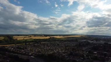 Aerial footage by drone high angle view of London Luton City of England with Buildings