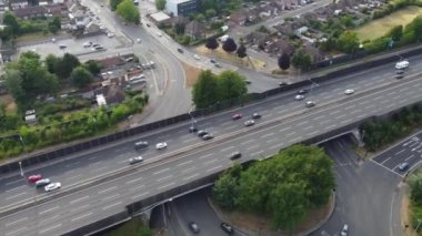 Aerial footage by drone high angle view of London Luton City of England with Buildings