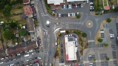 Aerial footage by drone high angle view of London Luton City of England with Buildings