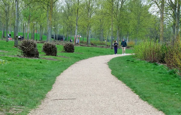 stock image Milton Keynes, England, UK - April 9, 2023: People at Willen Lake. Willen Lake is a visitor attraction and public park in Milton Keynes, Buckinghamshire