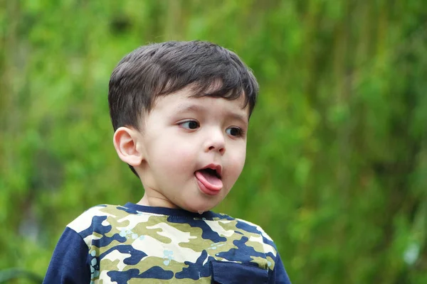 stock image Luton, England, United Kingdom - May 9, 2023: cute little boy in spring park 