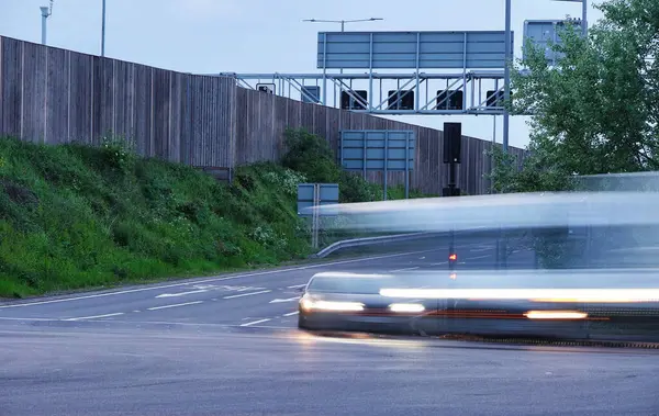 stock image England, United Kingdom - May 15, 2023: long exposure photo of motorways. Night traffic