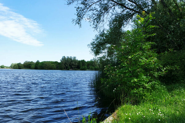 Milton Keynes, England, United Kingdom - May 21, 2023: View of Caldecotte Lake Park 
