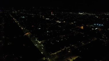 Night Aerial View of Illuminated British City. Drone's Footage of Luton Town of England at Night